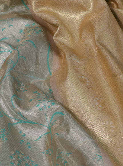 Tissue semi kanjivaram saree cream teal blue and baby pink with allover brocade weaves and zari woven border