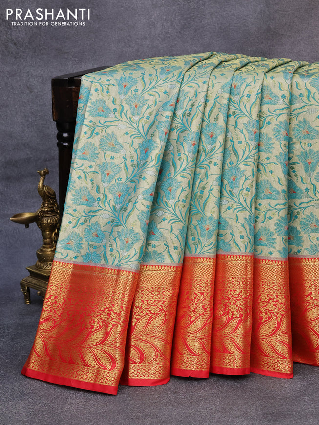 Tissue semi kanjivaram saree cream teal blue and red with allover floral brocade weaves and long zari woven border