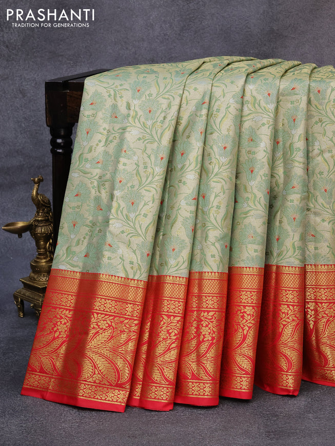 Tissue semi kanjivaram saree cream pastel green and red with allover floral brocade weaves and long zari woven border