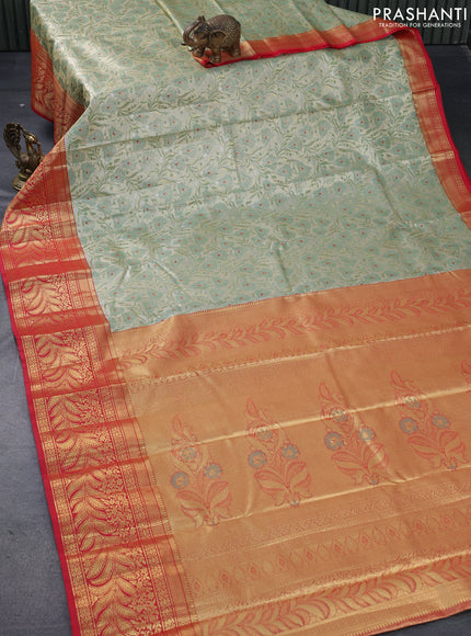 Tissue semi kanjivaram saree cream pastel green and red with allover floral brocade weaves and long zari woven border