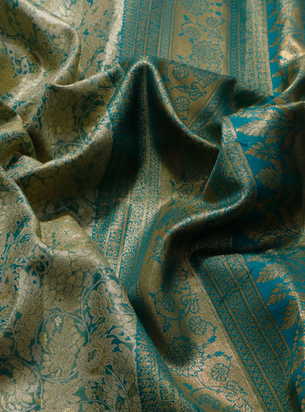 Tissue semi kanjivaram saree teal green shade and teal blue with allover floral brocade weaves and long zari woven border