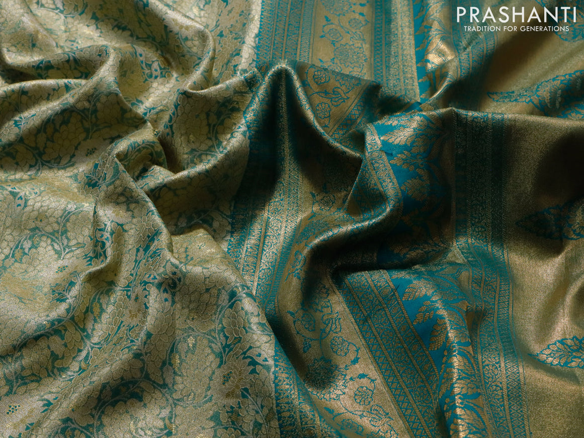 Tissue semi kanjivaram saree teal green shade and teal blue with allover floral brocade weaves and long zari woven border