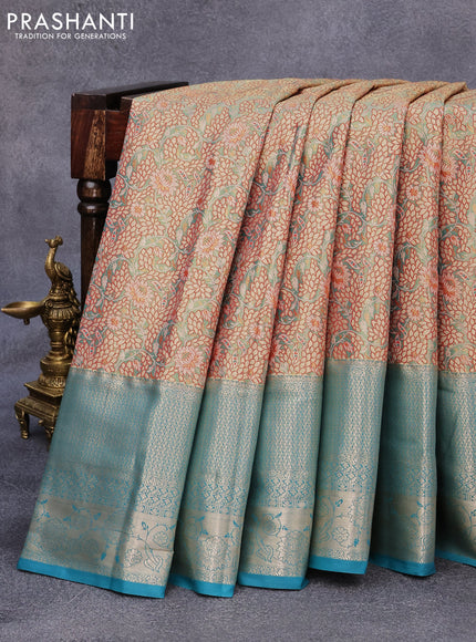 Tissue semi kanjivaram saree teal green shade red and teal blue with allover floral brocade weaves and long zari woven border