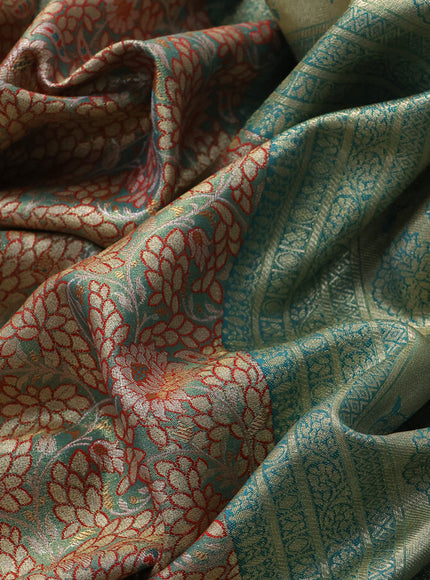 Tissue semi kanjivaram saree teal green shade red and teal blue with allover floral brocade weaves and long zari woven border