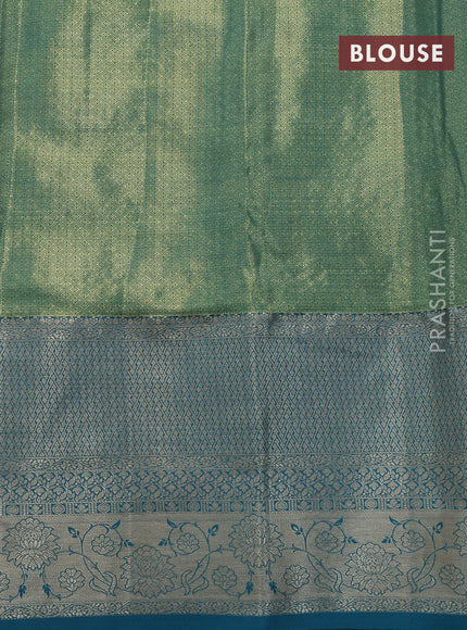 Tissue semi kanjivaram saree teal green shade red and teal blue with allover floral brocade weaves and long zari woven border