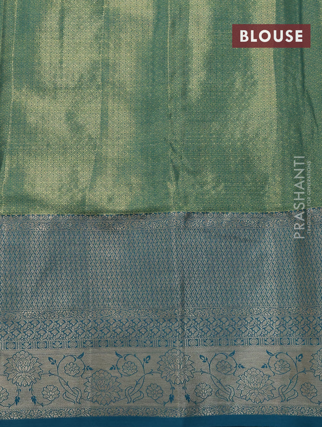 Tissue semi kanjivaram saree teal green shade red and teal blue with allover floral brocade weaves and long zari woven border