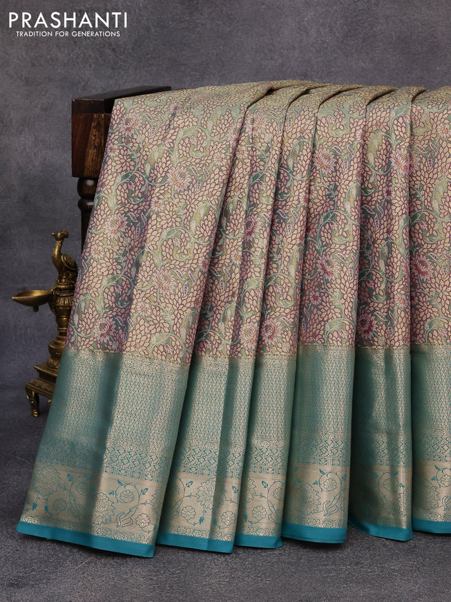 Tissue semi kanjivaram saree teal green purple and blue shade with allover floral brocade weaves and long zari woven border