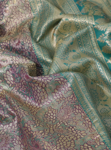 Tissue semi kanjivaram saree teal green purple and blue shade with allover floral brocade weaves and long zari woven border