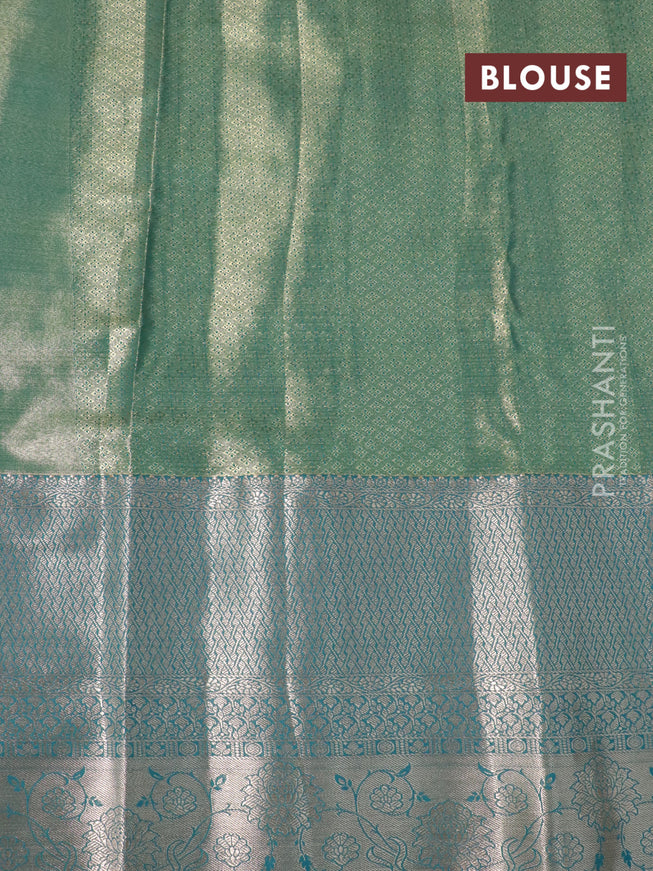 Tissue semi kanjivaram saree teal green purple and blue shade with allover floral brocade weaves and long zari woven border