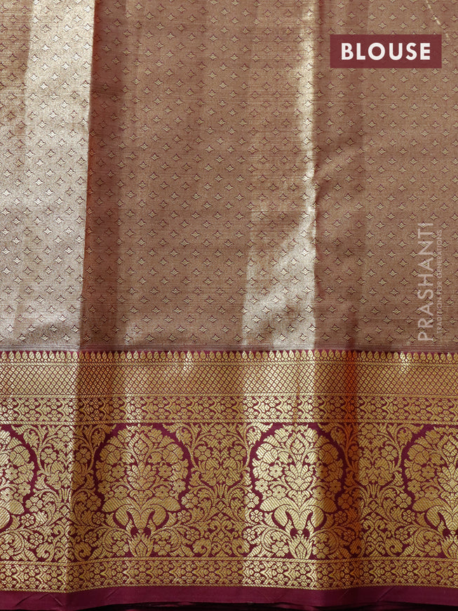 Tissue semi kanjivaram saree cream peach pink and wine shade with allover floral brocade weaves and long zari woven border