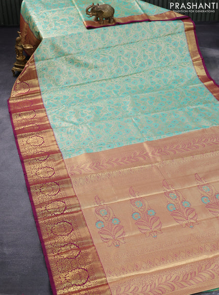 Tissue semi kanjivaram saree cream teal green shade and purple with allover floral brocade weaves and long zari woven border