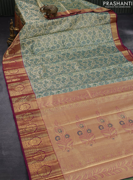 Tissue semi kanjivaram saree beige green and purple with allover floral brocade weaves and long zari woven border