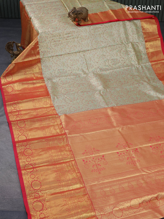 Tissue semi kanjivaram saree pista green shade and red with allover brocade weaves and long zari woven border