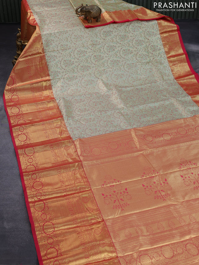 Tissue semi kanjivaram saree cream pastel green and red with allover brocade weaves and long zari woven border