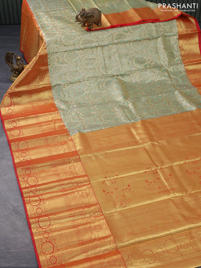 Tissue semi kanjivaram saree beige teal green and red with allover brocade weaves and long zari woven border