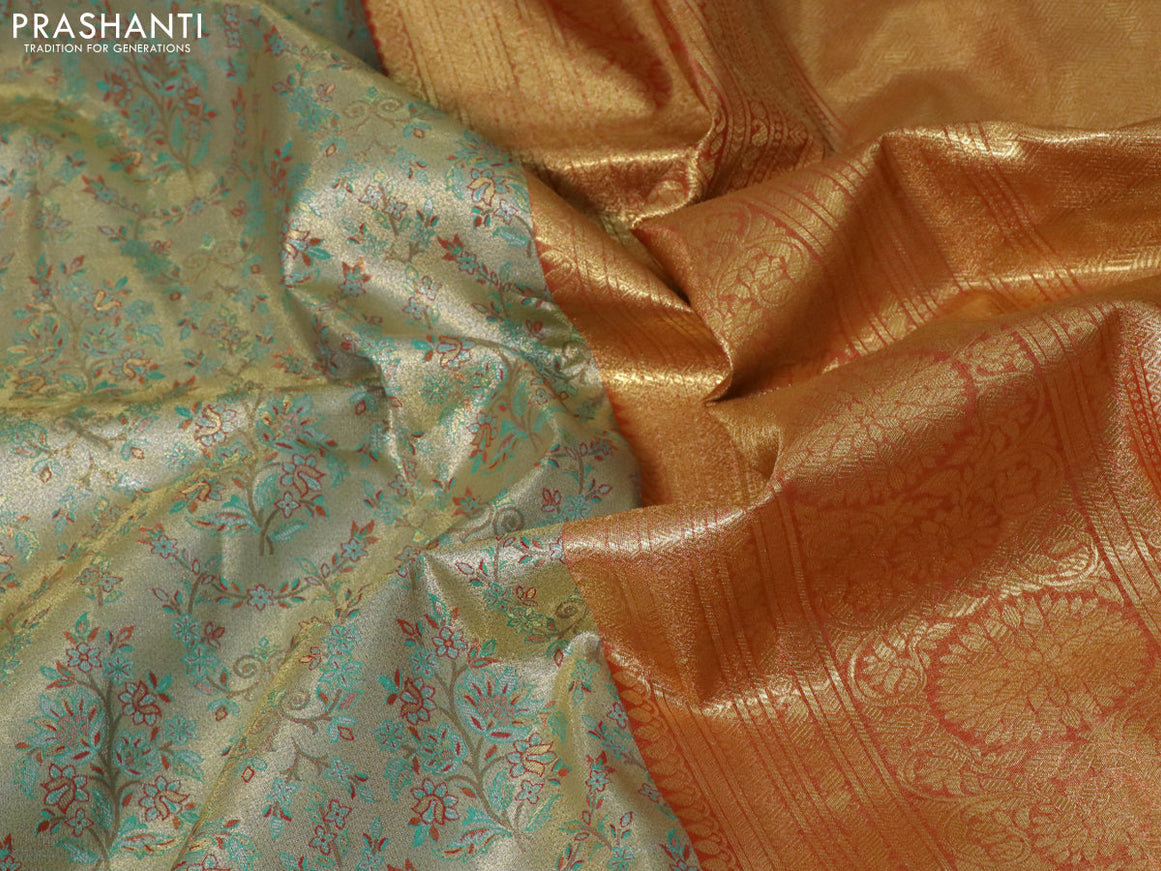 Tissue semi kanjivaram saree beige teal green and red with allover brocade weaves and long zari woven border