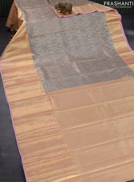 Tissue semi kanjivaram saree beige and baby pink with allover brocade weaves and long zari woven border