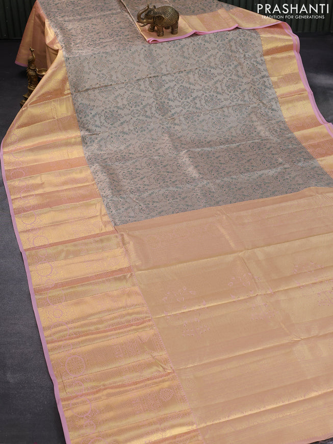 Tissue semi kanjivaram saree beige and baby pink with allover brocade weaves and long zari woven border