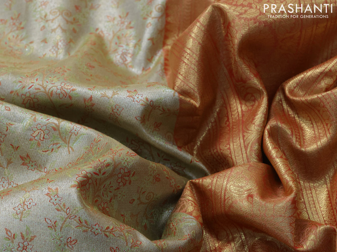 Tissue semi kanjivaram saree beige green and red with allover brocade weaves and long zari woven border