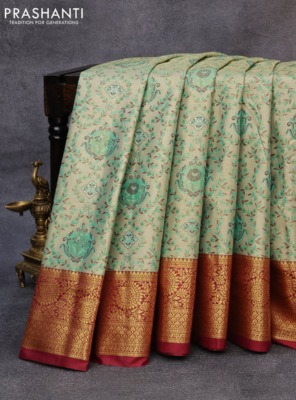 Tissue semi kanjivaram saree beige teal green and maroon with allover brocade weaves and floral zari woven border