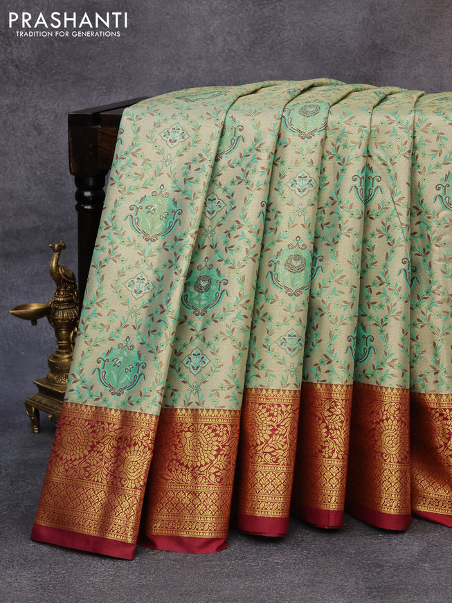 Tissue semi kanjivaram saree beige teal green and maroon with allover brocade weaves and floral zari woven border