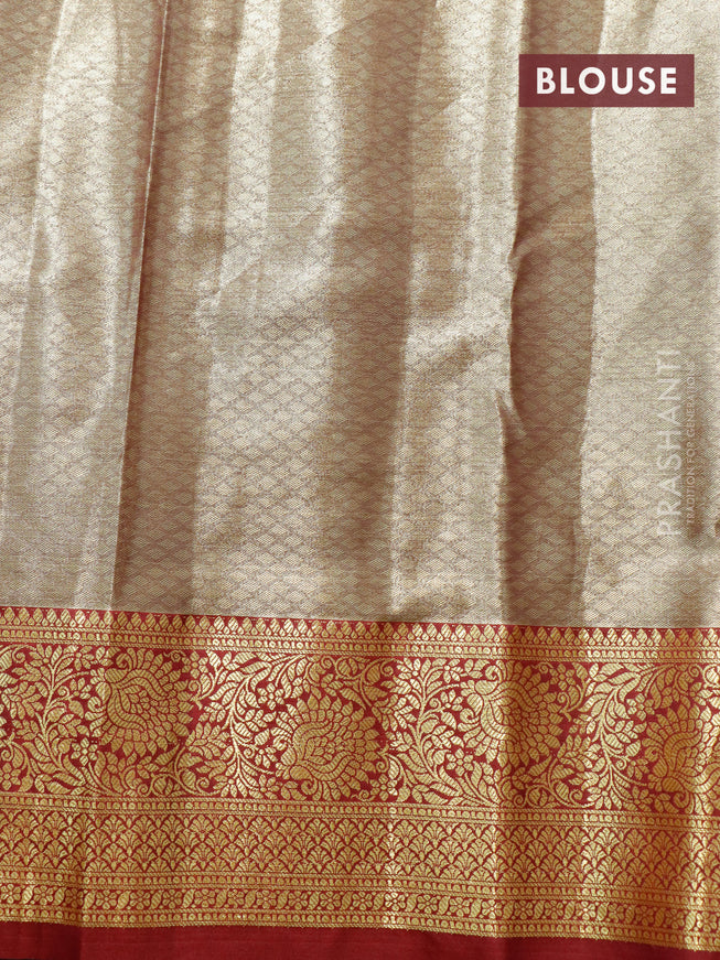 Tissue semi kanjivaram saree beige teal green and maroon with allover brocade weaves and floral zari woven border