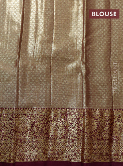 Tissue semi kanjivaram saree cream teal green and wine shade with allover floral brocade weaves and floral zari woven border