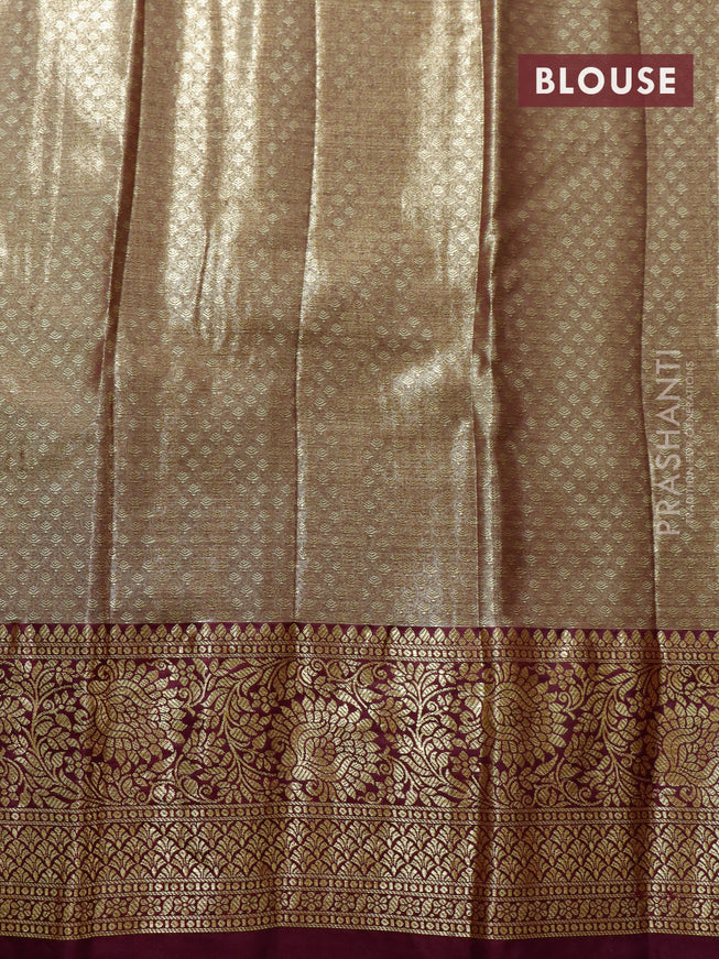 Tissue semi kanjivaram saree cream teal green and wine shade with allover floral brocade weaves and floral zari woven border