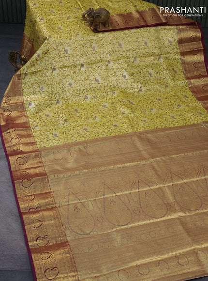 Tissue semi kanjivaram saree lime yellow and purple with allover brocade weaves and zari woven border