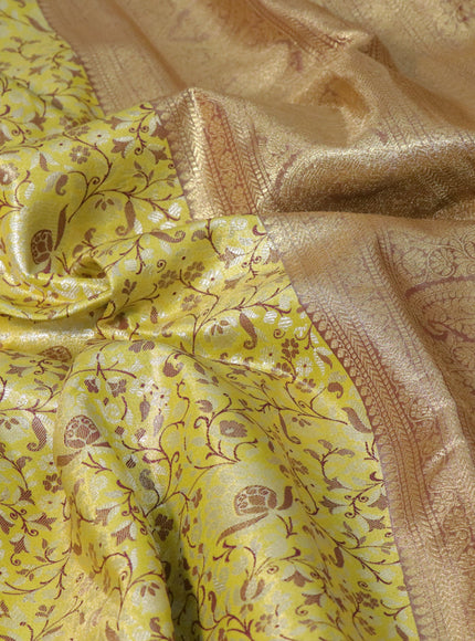 Tissue semi kanjivaram saree lime yellow and purple with allover brocade weaves and zari woven border