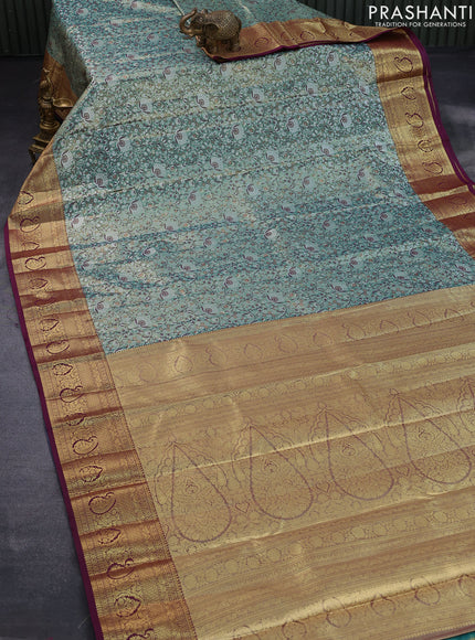 Tissue semi kanjivaram saree teal green and purple with allover brocade weaves and zari woven border