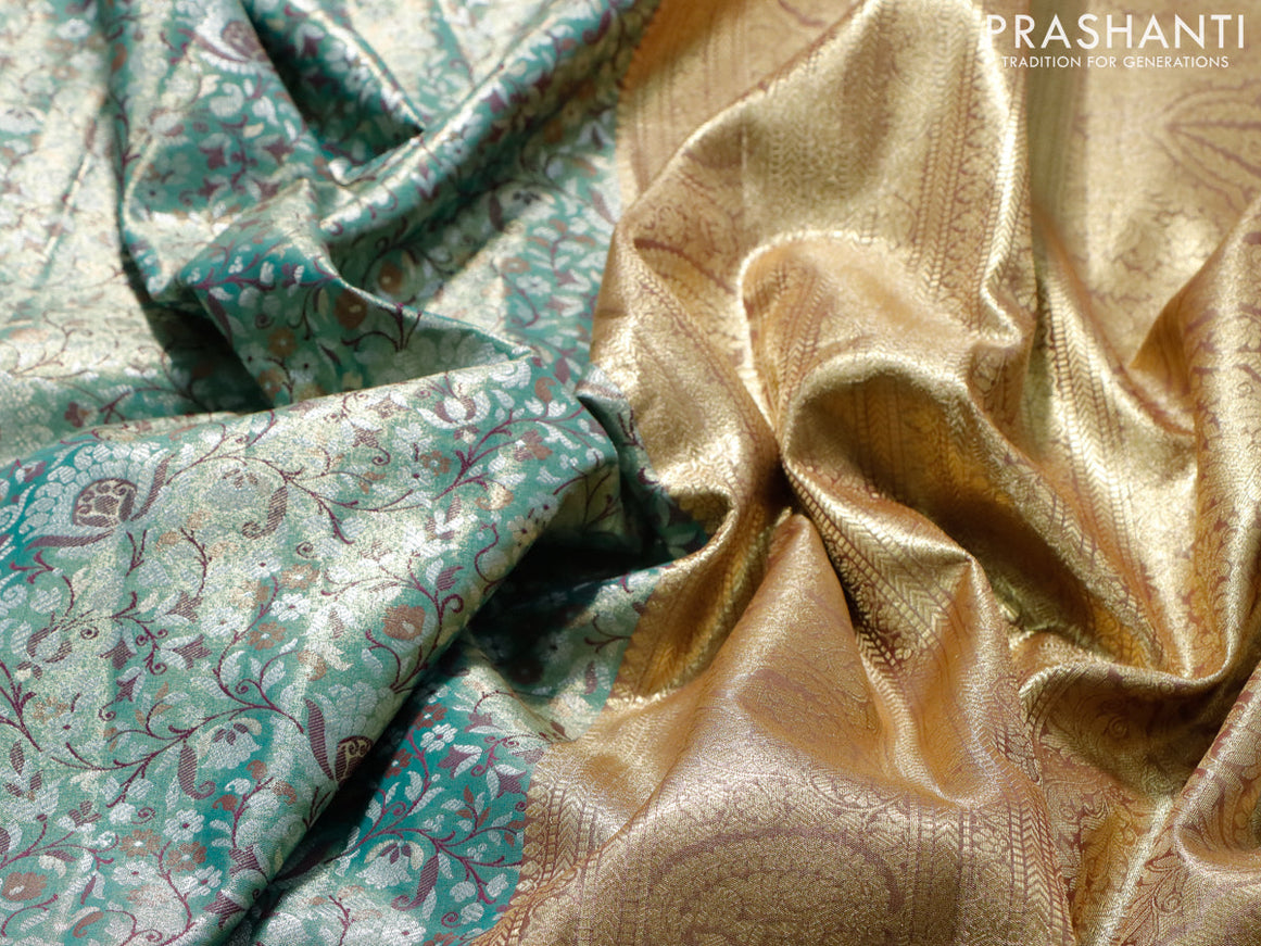 Tissue semi kanjivaram saree teal green and purple with allover brocade weaves and zari woven border