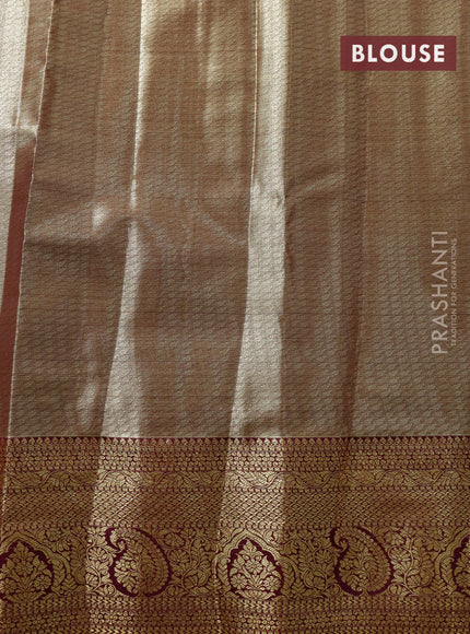 Tissue semi kanjivaram saree teal green and purple with allover brocade weaves and zari woven border