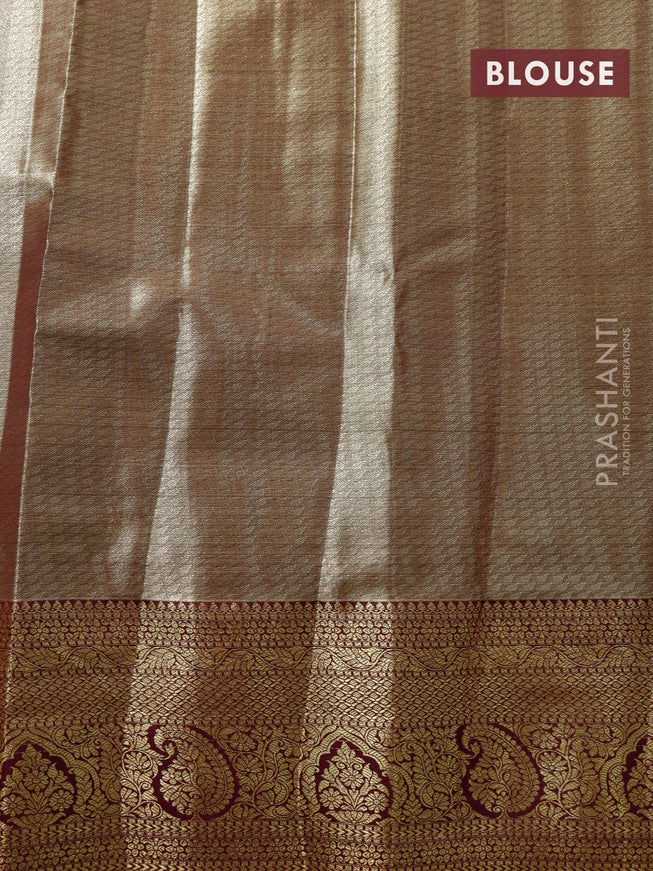 Tissue semi kanjivaram saree teal green and purple with allover brocade weaves and zari woven border