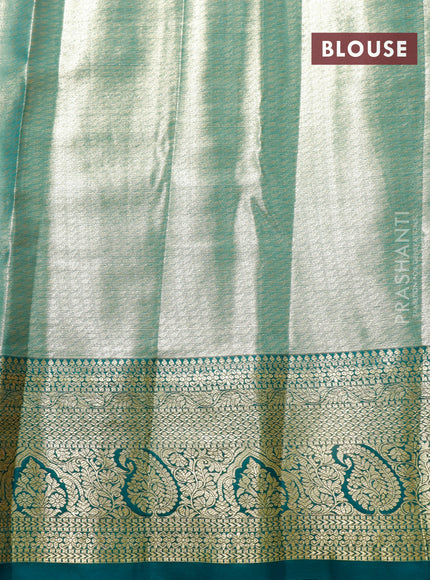 Tissue semi kanjivaram saree peach pink and teal green with allover brocade weaves and zari woven border