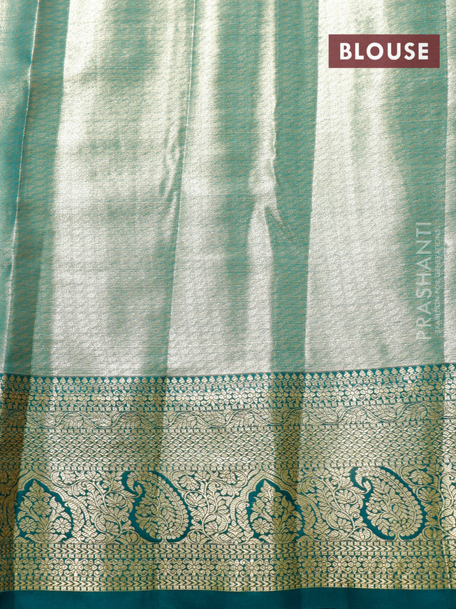 Tissue semi kanjivaram saree peach pink and teal green with allover brocade weaves and zari woven border