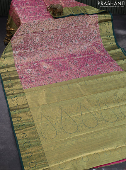 Tissue semi kanjivaram saree pink shade and green with allover brocade weaves and zari woven border