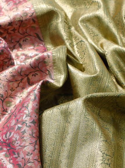 Tissue semi kanjivaram saree pink shade and green with allover brocade weaves and zari woven border