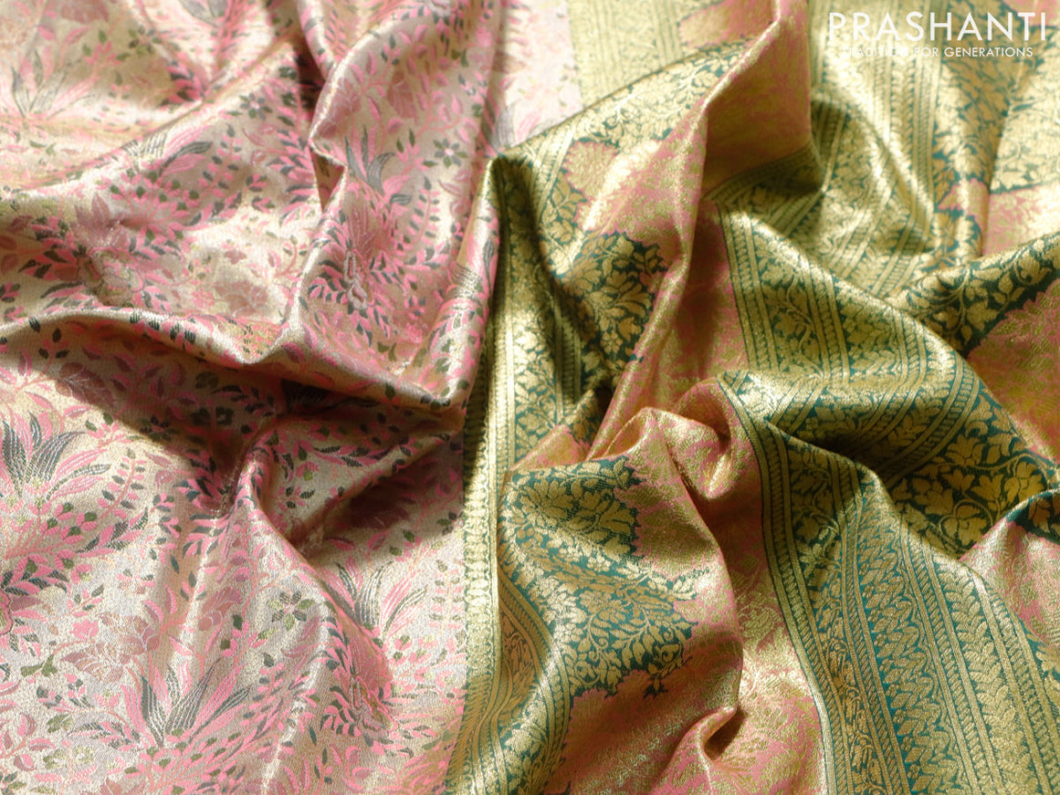 Tissue semi kanjivaram saree cream pink shade and green with allover brocade weaves and long floral zari woven border