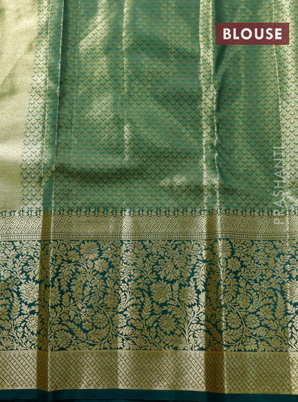 Tissue semi kanjivaram saree cream pink shade and green with allover brocade weaves and long floral zari woven border