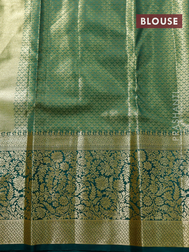 Tissue semi kanjivaram saree cream pink shade and green with allover brocade weaves and long floral zari woven border