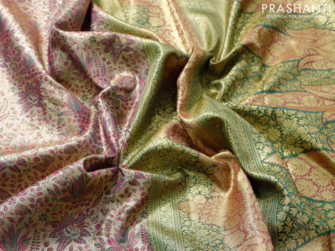 Tissue semi kanjivaram saree cream magenta pink and green with allover brocade weaves and long floral zari woven border