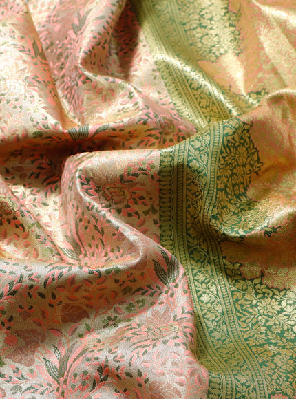 Tissue semi kanjivaram saree gold peach pink and green with allover brocade weaves and long floral zari woven border