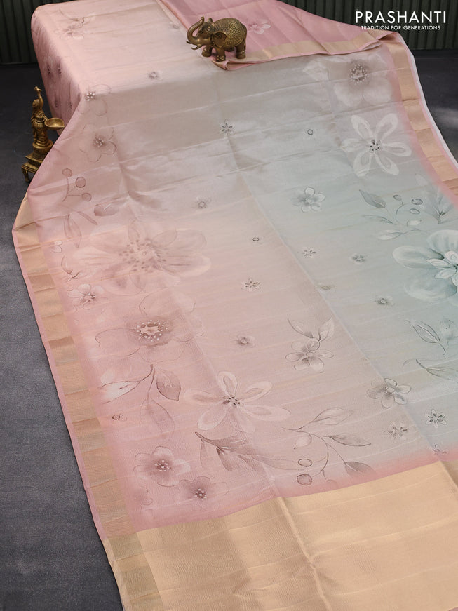 Crushed tissue saree pastel pink with allover floral digital prints and zari woven border