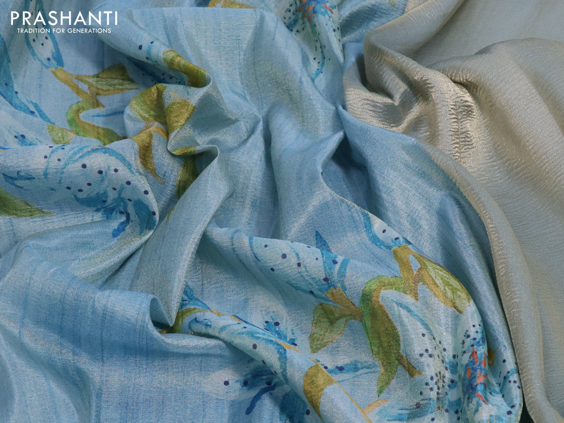 Crushed tissue saree light blue with allover floral digital prints and zari woven border