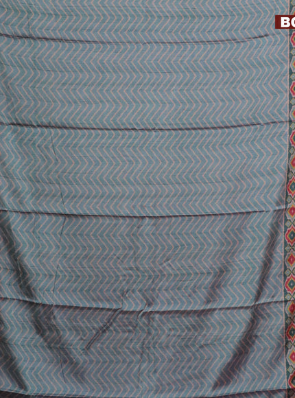 Semi kanchipuram silk saree teal blue and red with allover zig zag prints and zari woven border