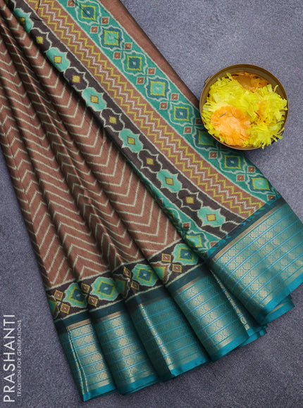 Semi kanchipuram silk saree brown and teal green with allover zig zag prints and zari woven border