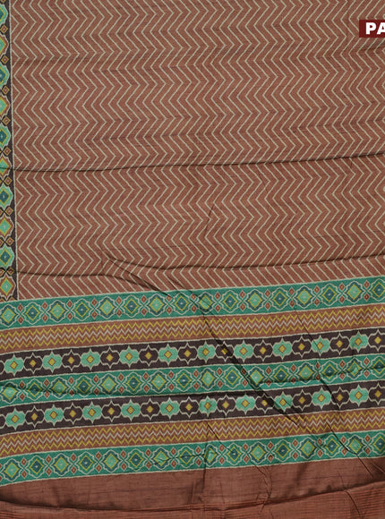 Semi kanchipuram silk saree brown and teal green with allover zig zag prints and zari woven border