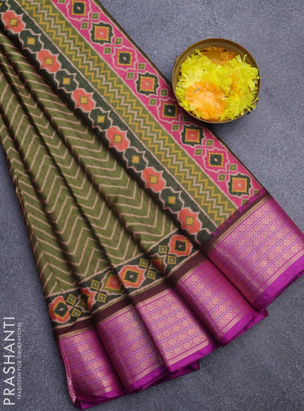 Semi kanchipuram silk saree green and purple with allover zig zag prints and zari woven border