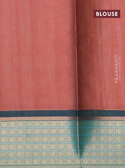 Semi kanchipuram silk saree rust shade and teal green with allover prints and zari woven border